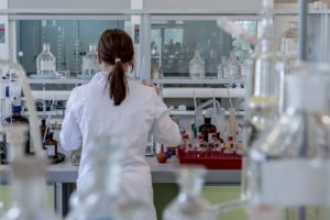 Back of lab personnel in laboratory