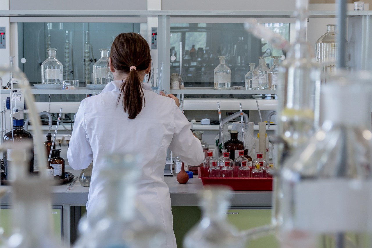 Back of lab personnel in laboratory