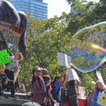 Children protesting to support FridaysForFuture